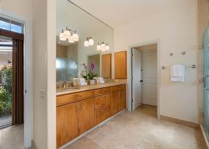 Dual sinks, granite counters and tile flooring