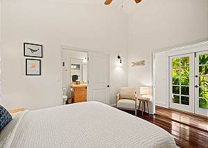 Double door entrance from hallway that opens to front lanai