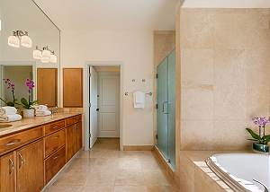 Master bathroom and entrance to laundry room 