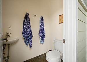 Outdoor bathroom by the shower for the pool area