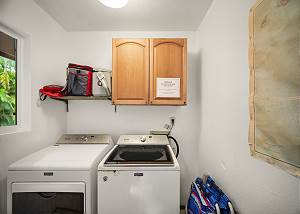 Full washer/dryer, beach gear room located in the room around th