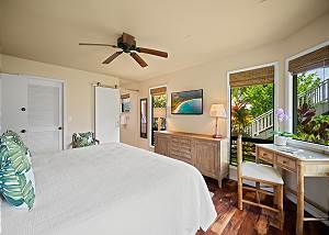 Master bedroom with desk and chair