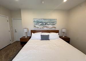 Queen size bed in the guest room