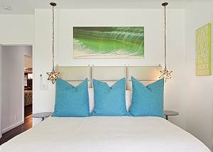 Guest Bedroom with plush bedding and linens