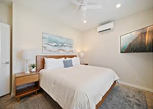Guest Bedroom with plush linens and bedding