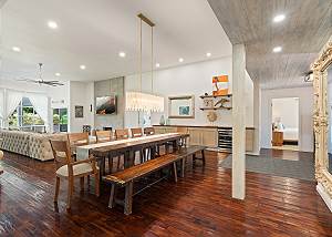 Dining table and living room is open themed