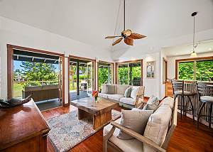 Open lanai doors create a wonderful indoor/outdoor space