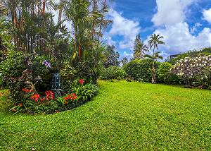 A stunning backyard featuring a water fountain