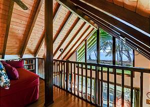 Upstairs reading nook offers vaulted ceiling and even better vie