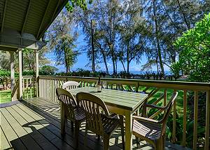 Covered patio allows you to enjoy the views of the crystal blue 