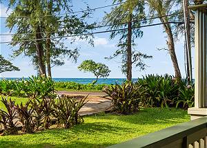 Lush front yard provides space from the road and perfect views o