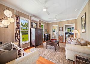 The inviting living room is cozy and homey