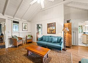 The vaulted ceilings make this living area feel spacious 