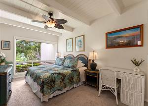 Upstairs master suite with a work desk