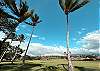 Lucky Rainbow!  View from beachfront clubhouse look back to hillside and Maui Eldorado