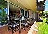 Comfortable lanai dining — perfect for morning coffee or sunset dinners