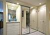 Large closet with plenty of space for luggage and personal belongings.