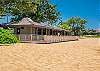 Exclusive Beachfront Clubhouse - onsite bathroom, outdoor shower, full kitchen, beach towels and chairs.