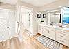 Spacious Bathroom with washer dryer, walk-in shower.