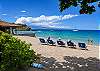 Your Maui beach day awaits — relax by the cabana with turquoise water, soak up the sunshine, and enjoy the beauty of Kaanapali.”