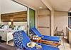 Premium padded teak recliners for ultimate for sweeping ocean and golf views!