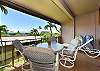 Covered lanai with comfortable seating and a peaceful view overlooking the Maui Eldorado grounds with a peek of the ocean.