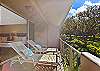 Wide-angle view of the lanai, showing generous outdoor space.