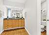 Wide hallway entry offering great storage and a clean transition into the living space.