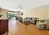 Living room with outdoor views, showing the peaceful greenery just outside.