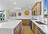 California Coastal Kitchen with custom oak cabinetry and stainless appliances.