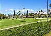 Scenic Ka?anapali Golf Course views stretching toward the ocean and swaying palm trees.