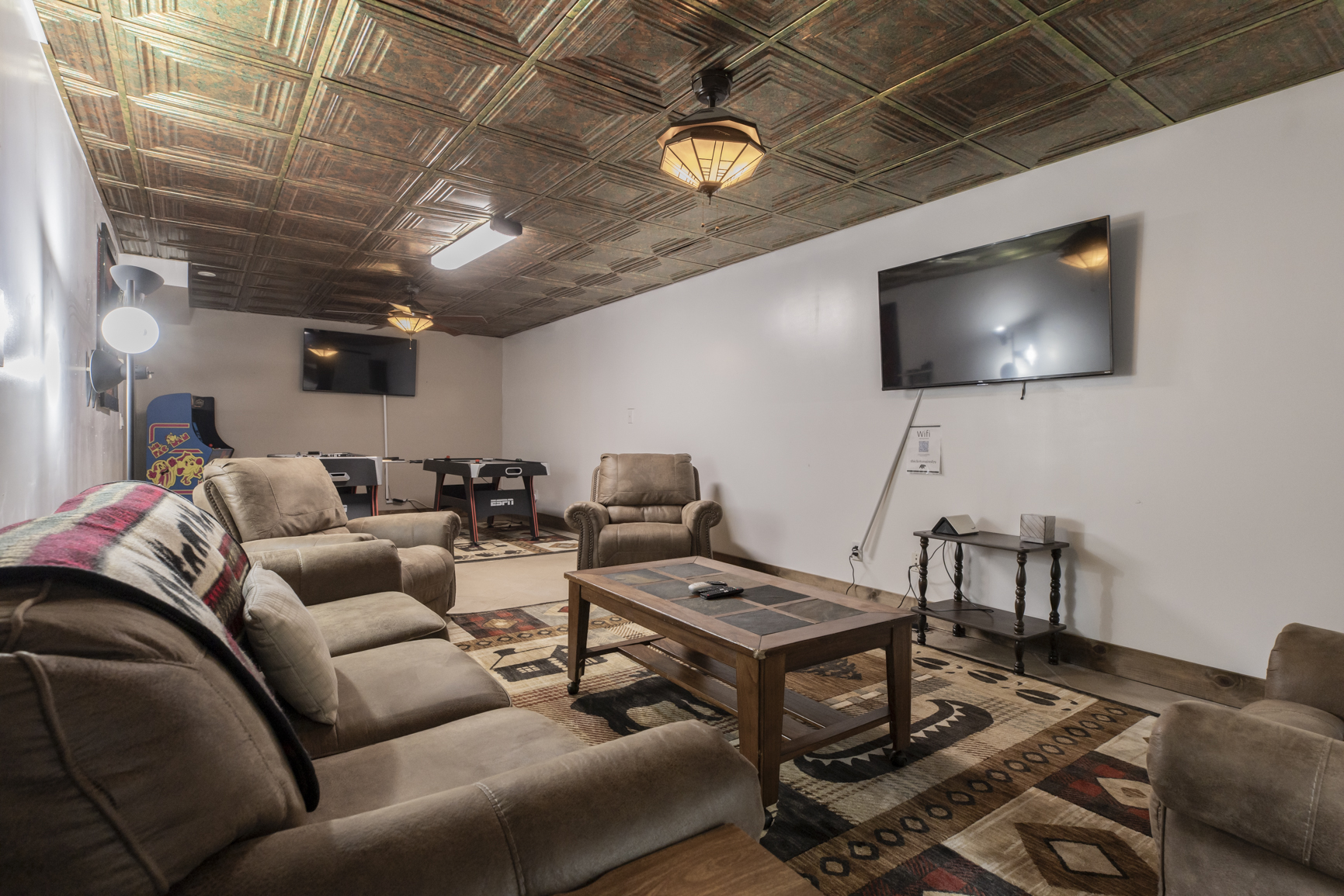Basement level game room/bonus room pull out queen couch