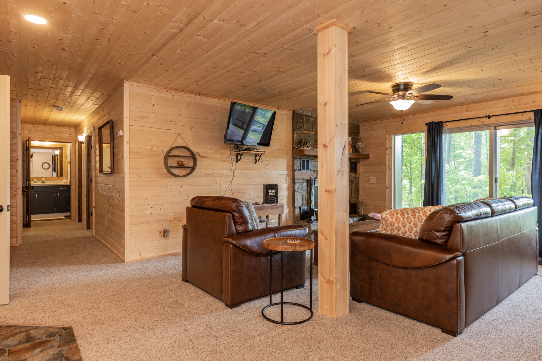 Lower Level Den and TV Room Wood Burning fireplace