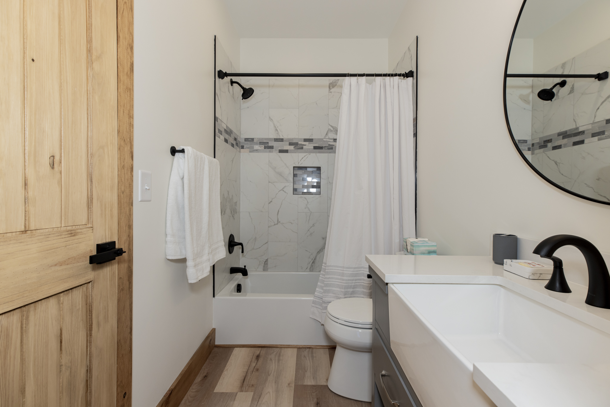 Basement level bath shower combo bathroom off queen bedroom