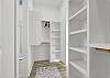 Primary bedroom walk-in closet- Located on main floor