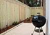 Grill and privacy fence.