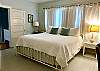 Upper level king bedroom #4 with attached shared full bath with tub and shower combo.   