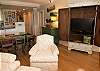 More photos of Two Mermaids condo:
Kitchen overlooks the living room so nobody misses a moment of bonding time. 