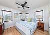 Primary bedroom.  Saatva Mattress King bed.  100% Cotton/ Linen Sheets. Ceiling fan. Plantation style blinds. Original Art from local artists including  Savannah's own Bellamy Murphy