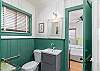 Jack and Jill half bathroom.   Access from the Master bedroom and Second bedroom.  