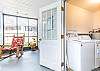 Laundry room in screened porch.