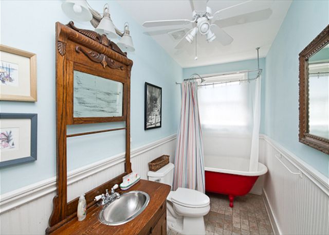 this bathroom features   old fashioned claw footed bathtub