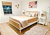 Another view of queen bedroom.