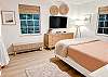 Cozy queen bedroom.