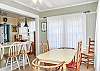 Dining room is right off the kitchen for easy serving and family time. 