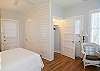 Beautiful light, white queen bedroom with en suite full bathroom. 