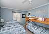 Queen bedroom with matching bunks! The whole family can be close, or the friends can sleep separate. There is a full bathroom in this room. You walk thru the king bedroom to the living/dining room). 