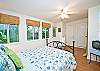 Queen bedroom #2. The cottage has 2 queen bedrooms and 1 double bedroom.  This queen room has its own bathroom, door to outside/backyard and the washer and dryer are in here as well. 