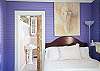 Another view of Bedroom #1 with view into bathroom.