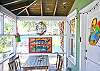 Another view of the front screened porch dining area!